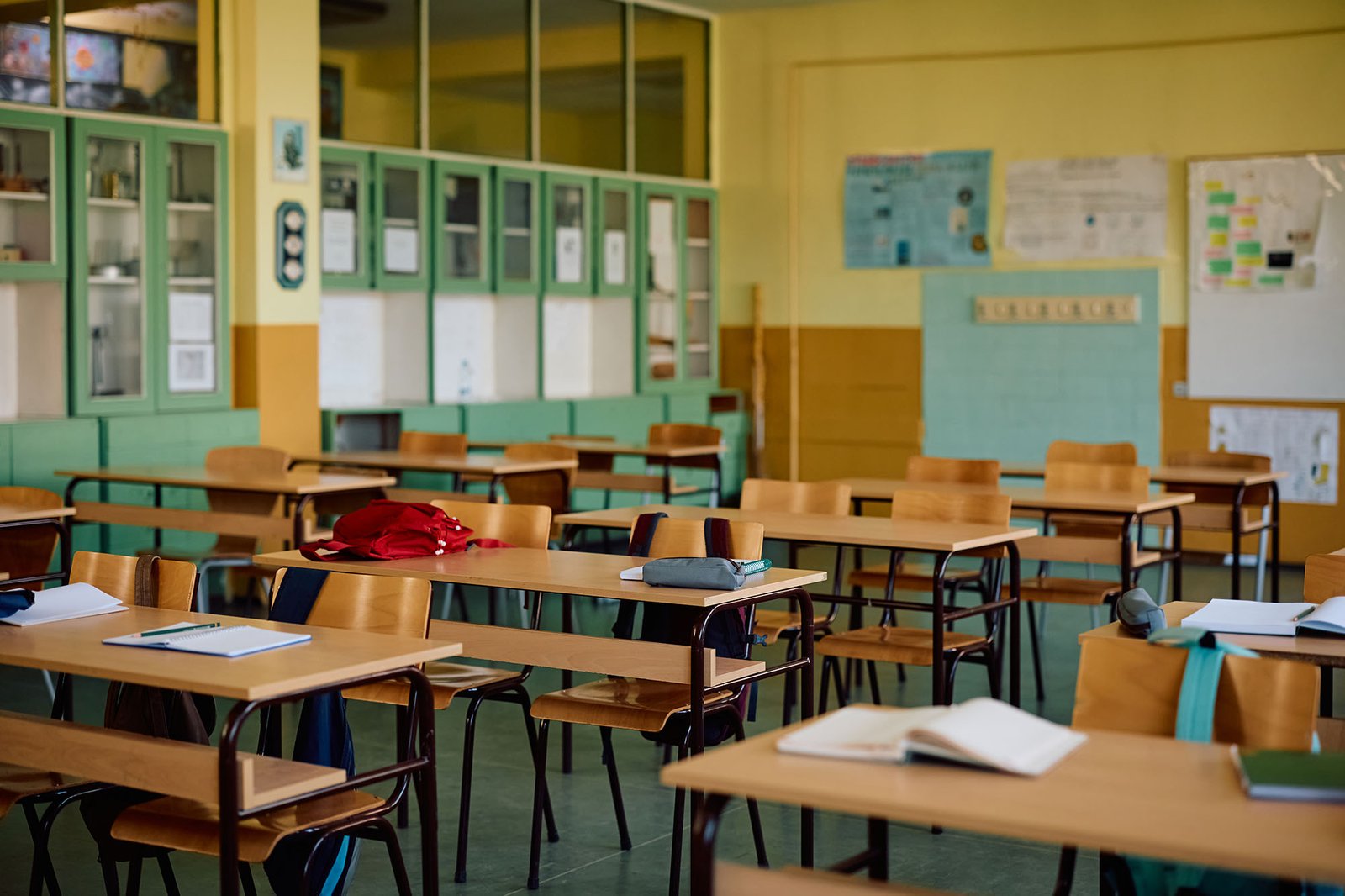 Empty elementary school classroom with networked devices left running after hours
